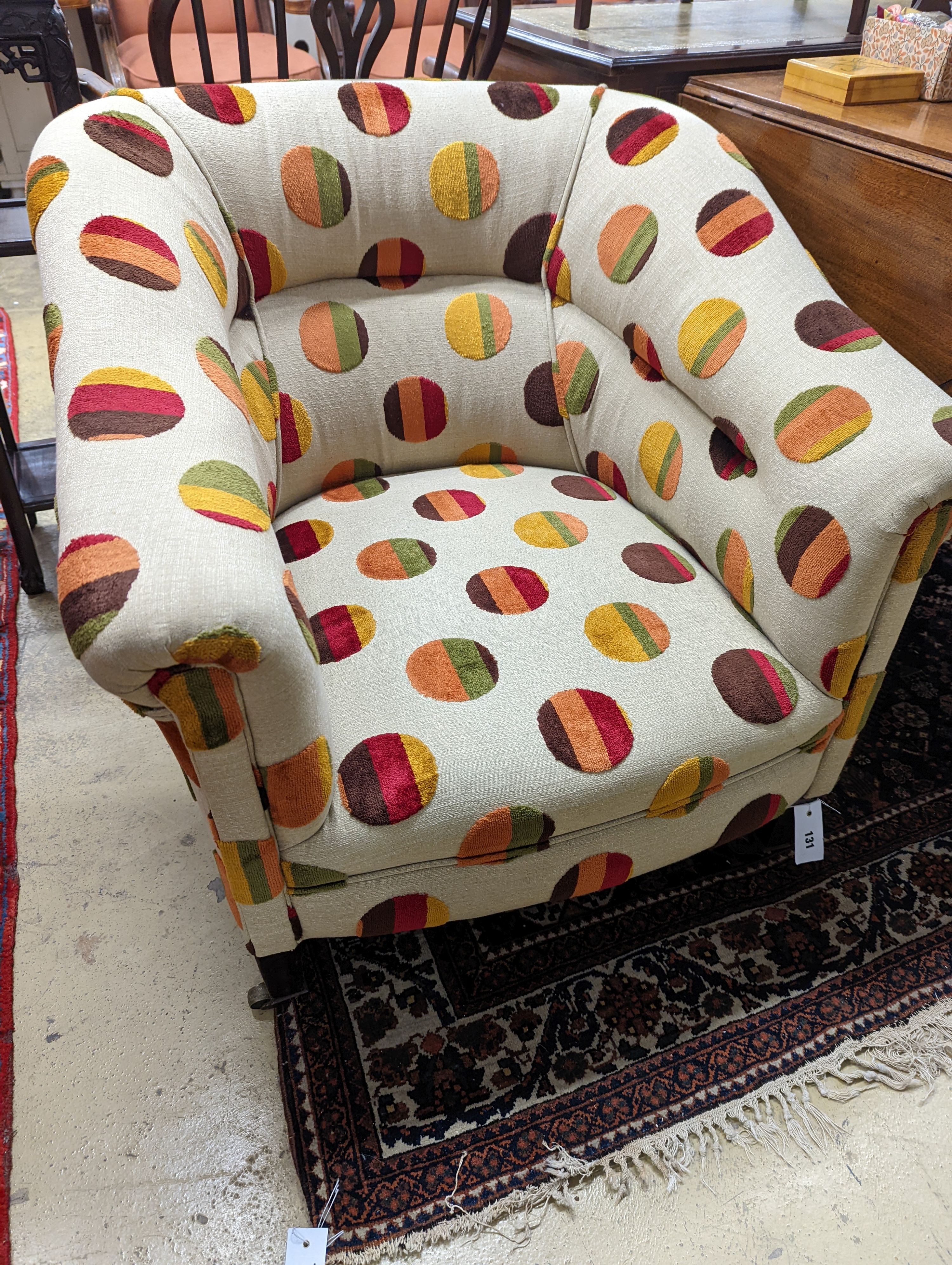 An Edwardian upholstered tub frame armchair, width 76cm, depth 68cm, height 72cm